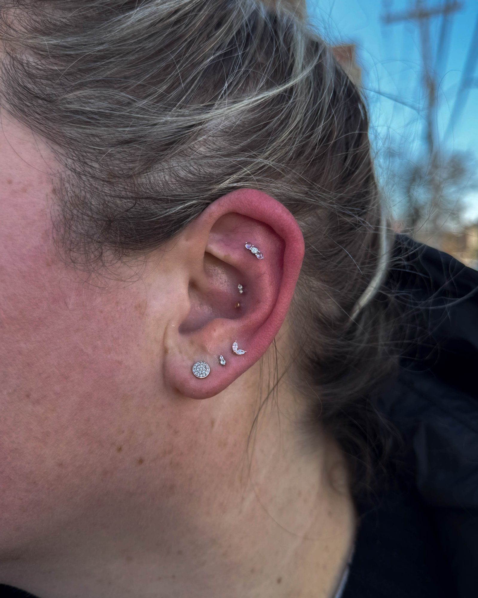 Triple ear piercing by Stab Daddy Bri