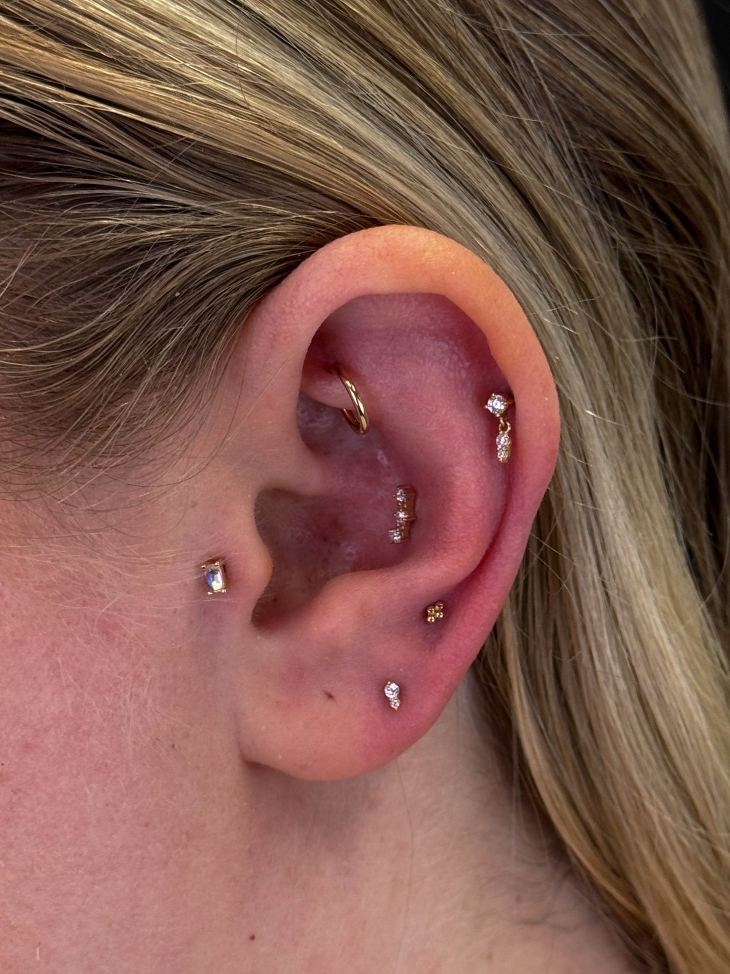 Completed ear curation by Stab Daddy Bri