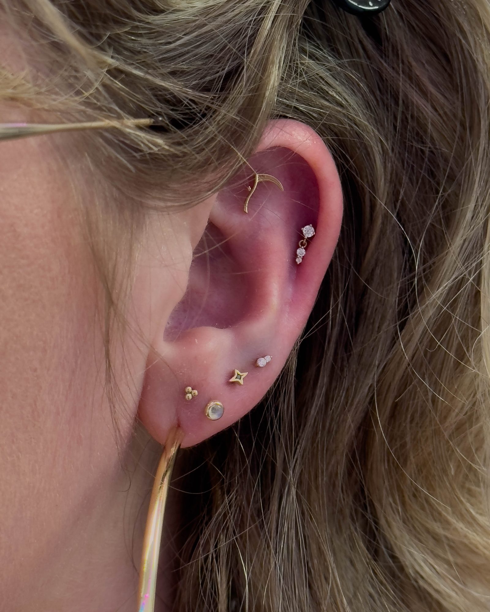 14ct gold double conch piercing by Stab Daddy Bri, Boston MA